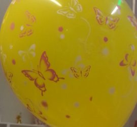 Latexballon gelb mit Schmetterlingen