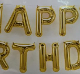 Schriftzug `HAPPY BIRTHDAY´ in goldenen Folienbuchstaben, 40 cm hoch, Luftfüllung